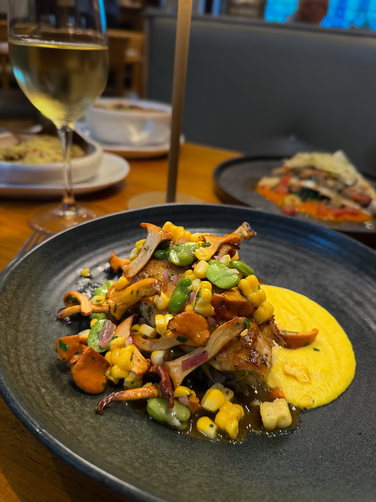 Chicken breast with cabbage, girolles, sweetcorn and broad beans
