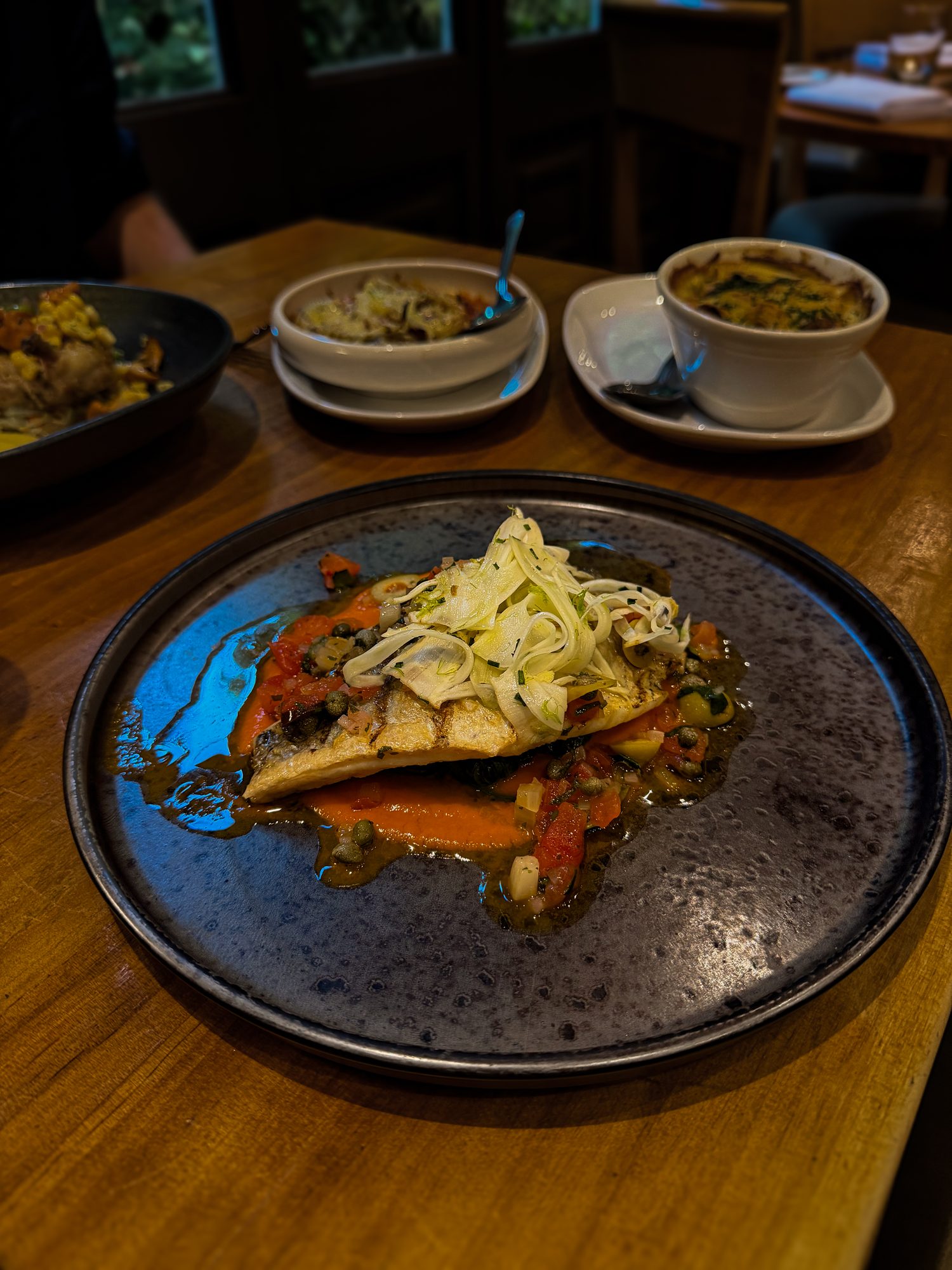 Fillet of sea bream with sauce vierge, capers, tomato, courgette and pickled fennel